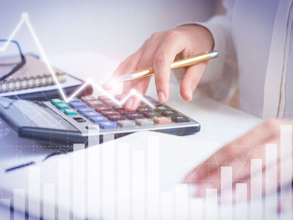 accountant calculating profit with financial analysis graphs